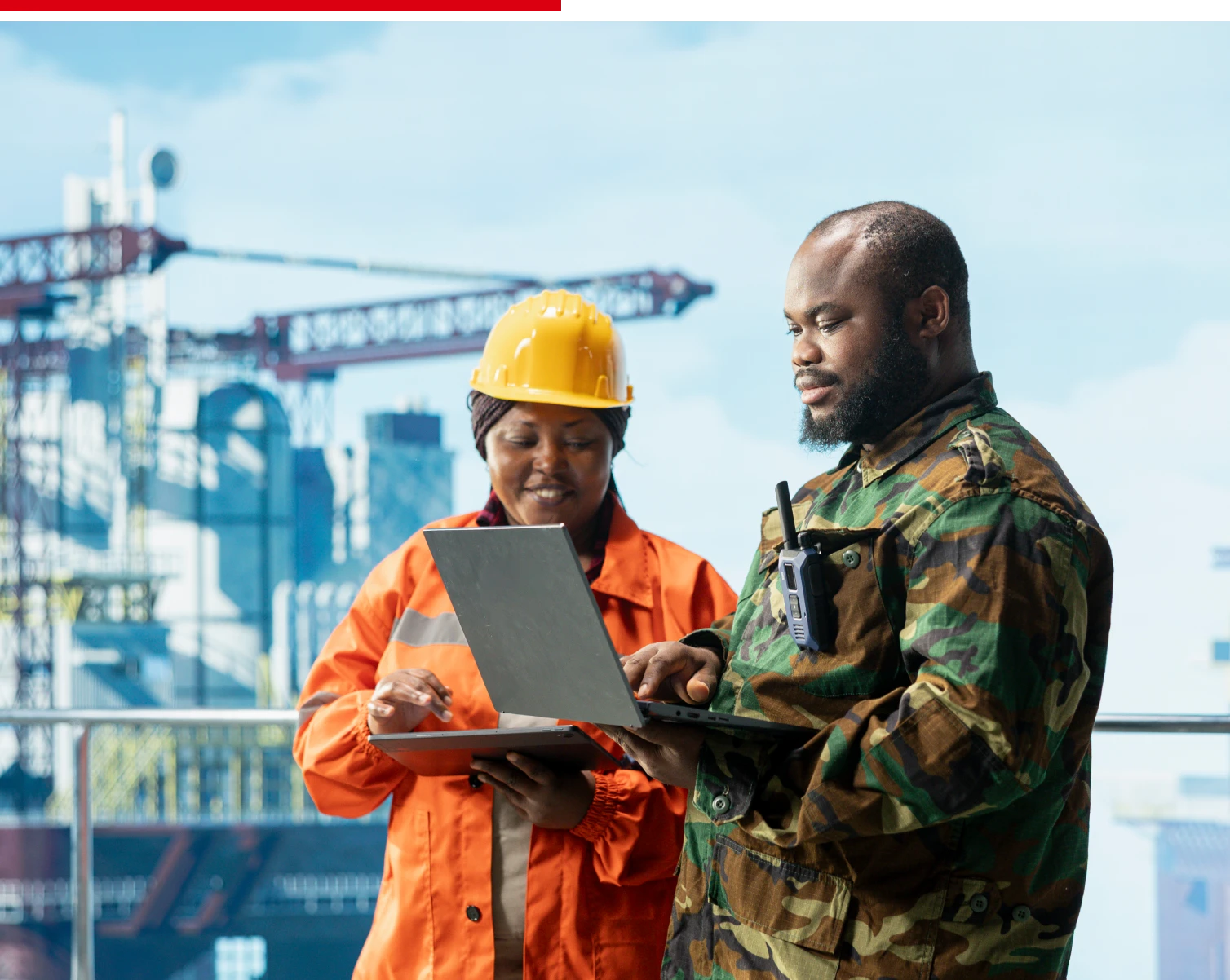 Workers in safety gear on site